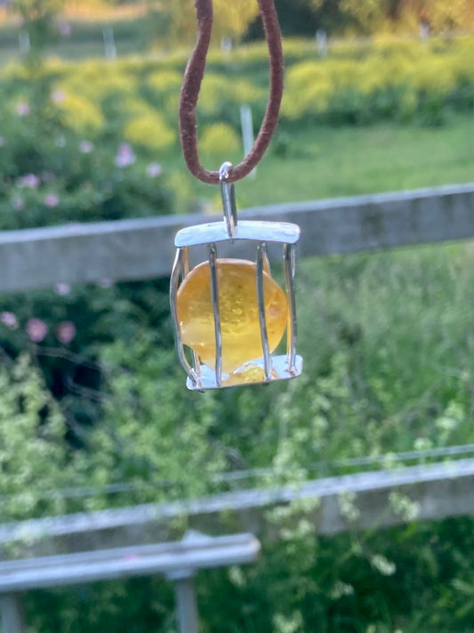 Amber cage pendant